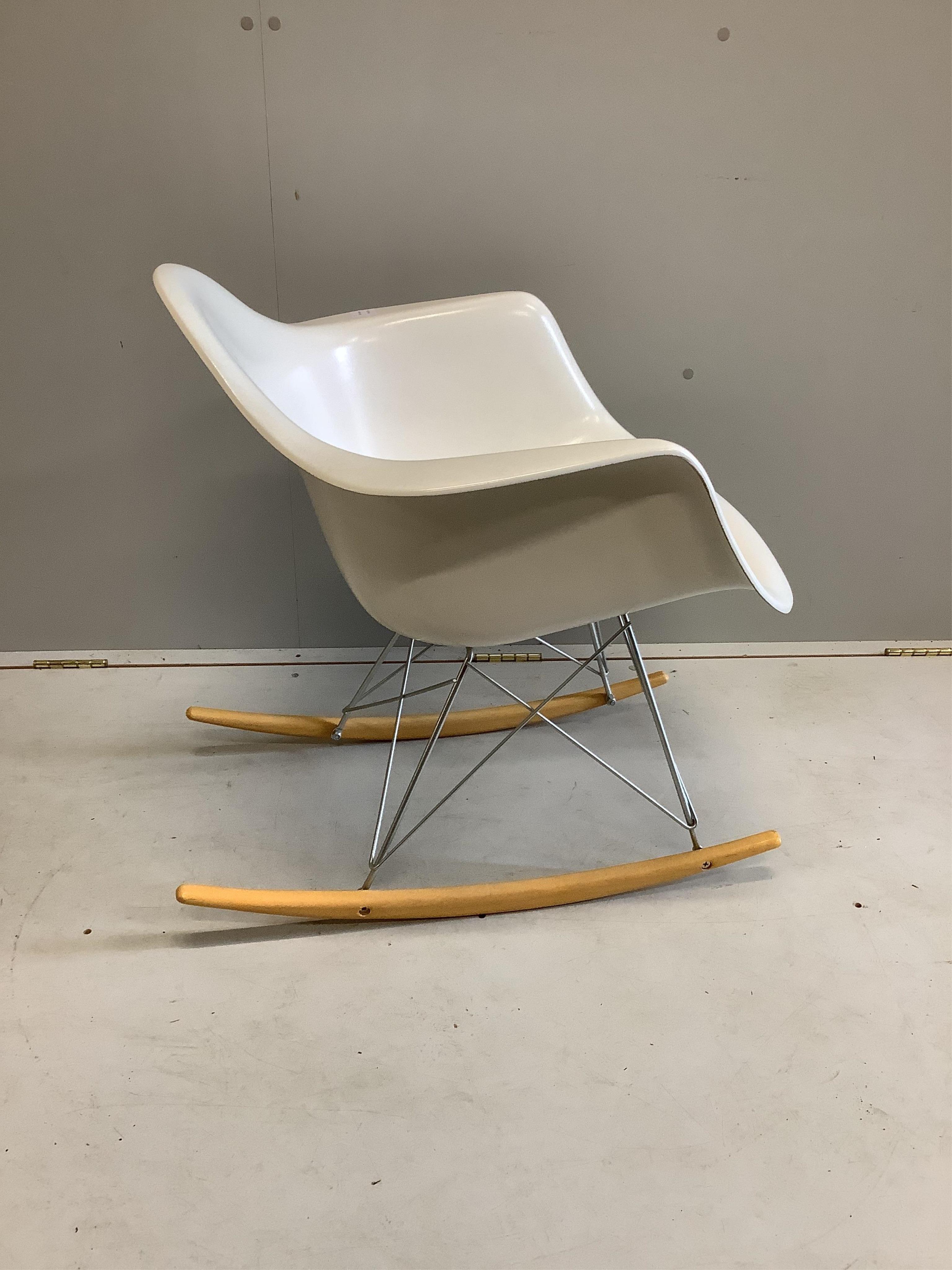 A Vitra Eames rocking chair, purchased from Skandium, width 63cm, depth 68cm, height 67cm